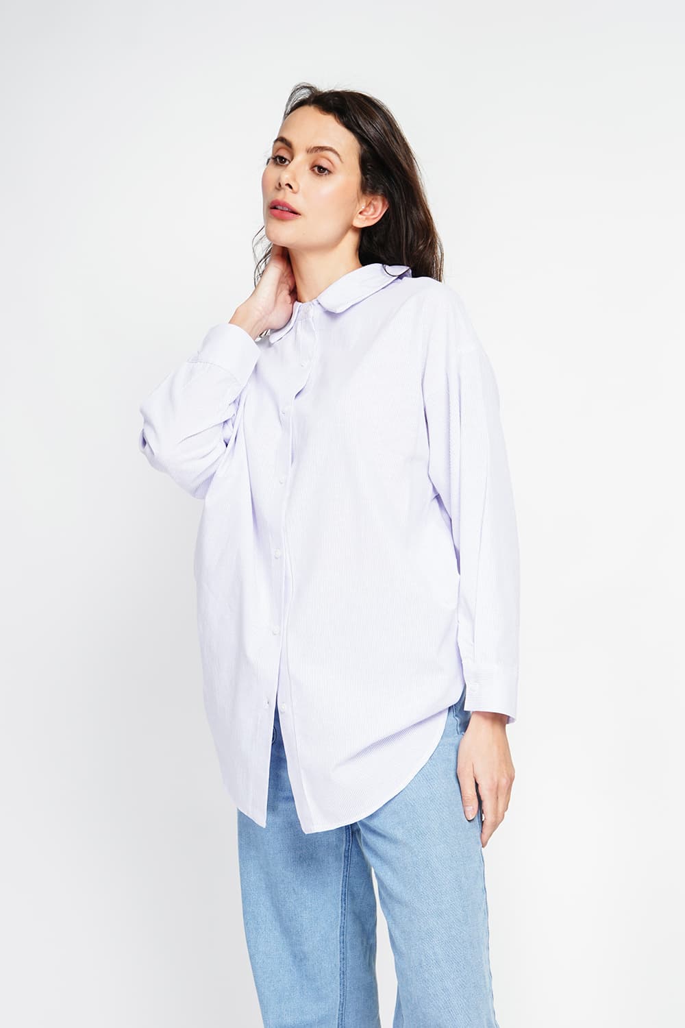Tunique col chemise boutonnée au dos et poignet à manches longueur 8