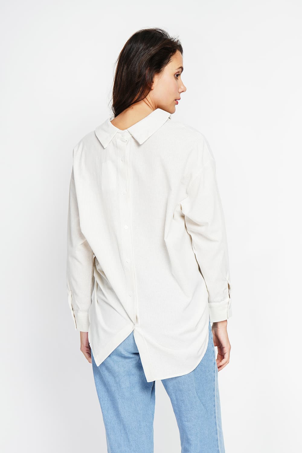 Tunique col chemise boutonnée au dos et poignet à manches longueur 9